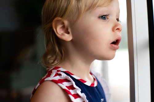 child-looking child looking out