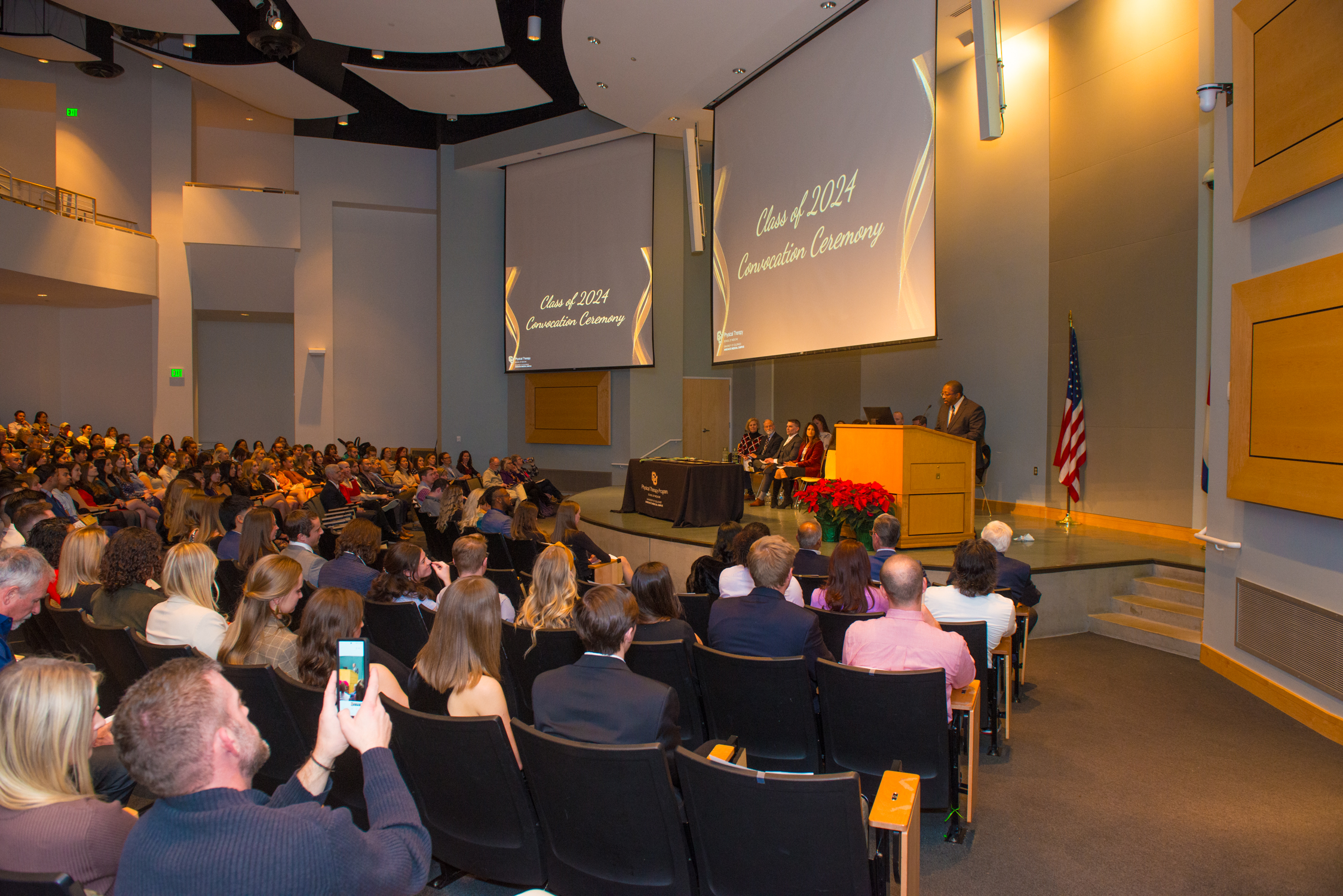 Photo of people gathered in the Ed 2 South Auditorium for the 2024 Convocation Ceremony.